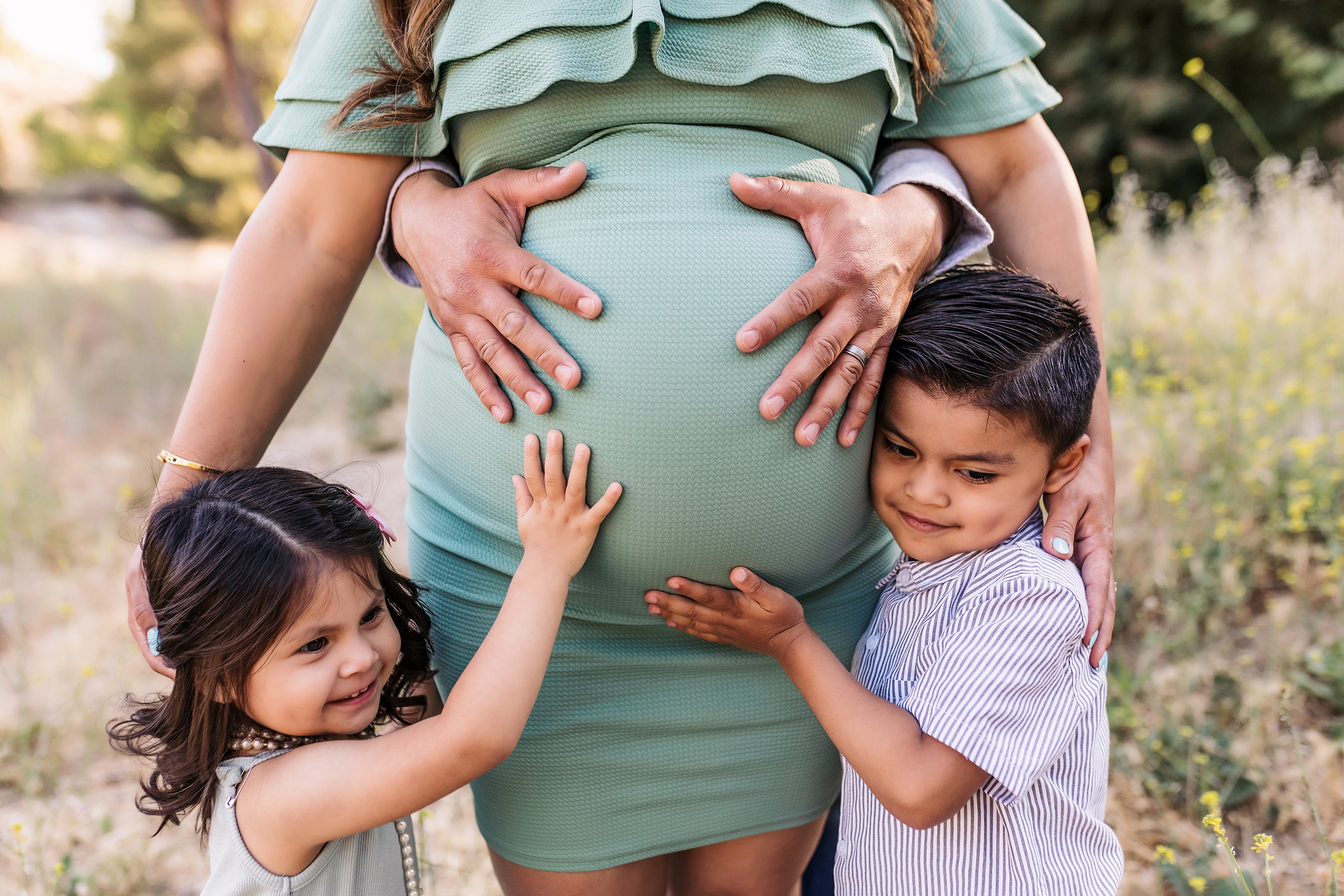 family maternity session with kids touching moms belly by sherman oaks maternity photographer a pocket of time photography