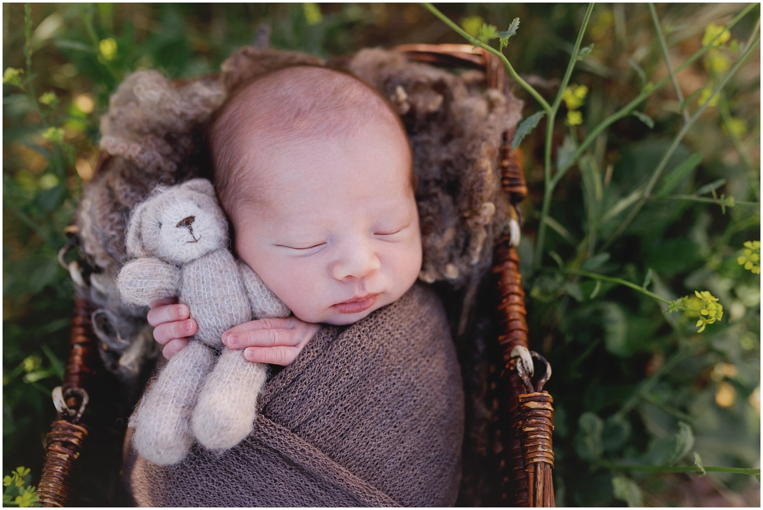 Newborn baby boy sleeping outside by A Pocket of Time Photography